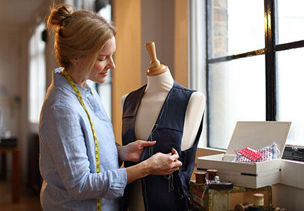 Seamstress at work. Seamstress at work.