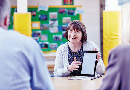 Woman on a tablet demonstrating. Woman on a tablet demonstrating.