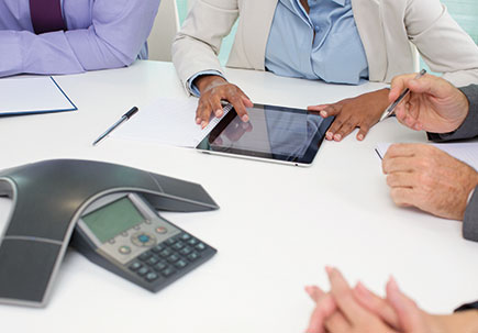 Mulitple devices being used in a meeting. Mulitple devices being used in a meeting.
