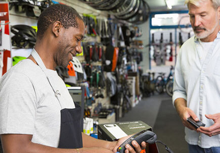 Man buying something from a store Man buying something from a store