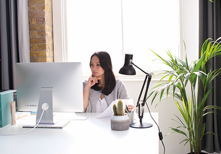 Woman working from a home office