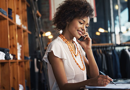 Woman working from a store. Woman working from a store.