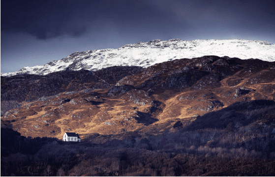 A remote house against a breath-taking landscape A remote house against a breath-taking landscape